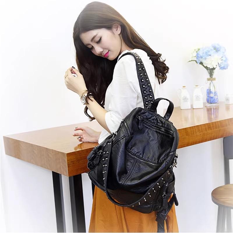 Large Capacity Solid Color Soft-Sided Backpack Fashionable Unisex Rivet Wash Leather Backpack Multi-Pocket Schoolbag