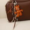 Leather Brown Bear Keychain With Articulated Limbs And Geometric Design For Fashion Accessories