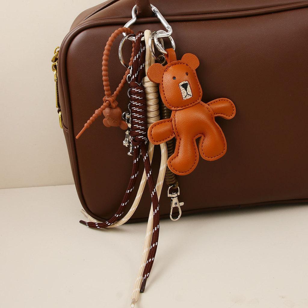 Leather Brown Bear Keychain With Articulated Limbs And Geometric Design For Fashion Accessories