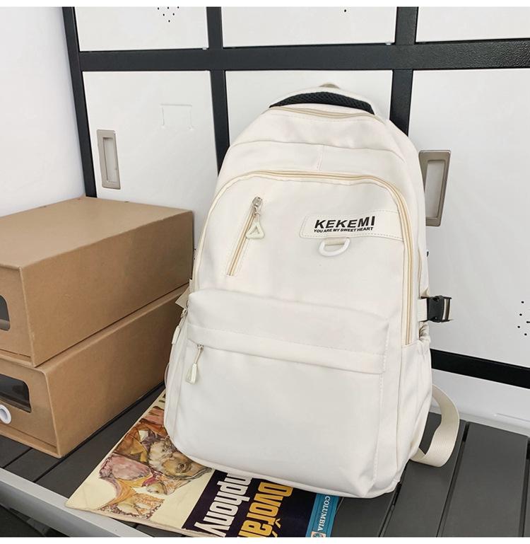 Schoolbag backpack men's 1011 new versatile large-capacity college backpack girls simple junior high school high school bag