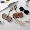 Litchi-funda para gafas en relieve, bonitas gafas de sol colgantes de cuero PU, bolsa de almacenamiento para gafas de lectura, soporte portátil para gafas de viaje