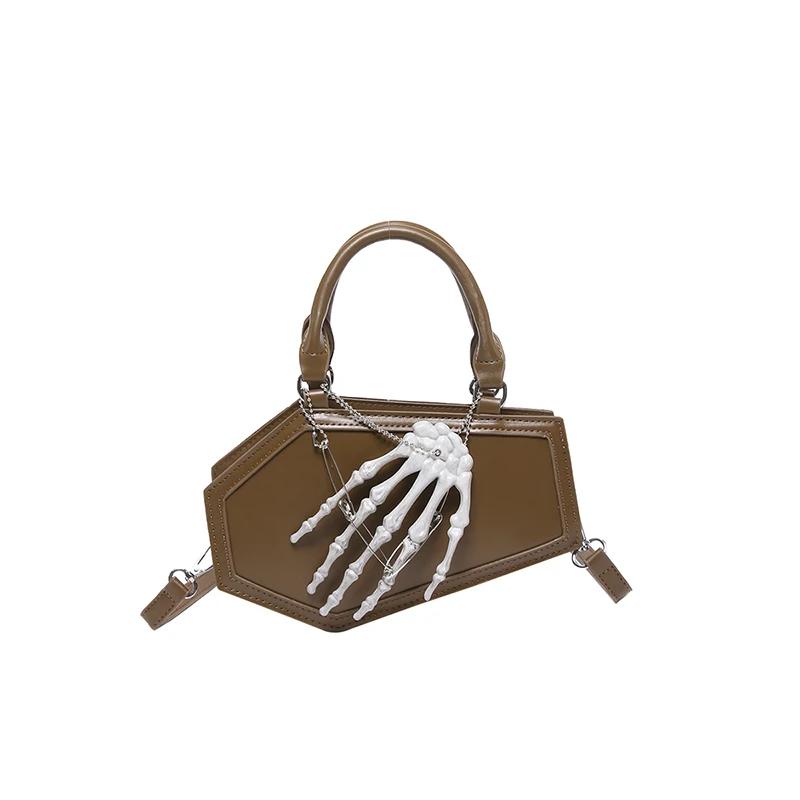 Autumn and winter new popular solid color leather punk style hand bone decoration portable fashion trend shoulder bag