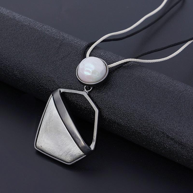 New women's necklace long high fashion retro personality trend pendant European and American