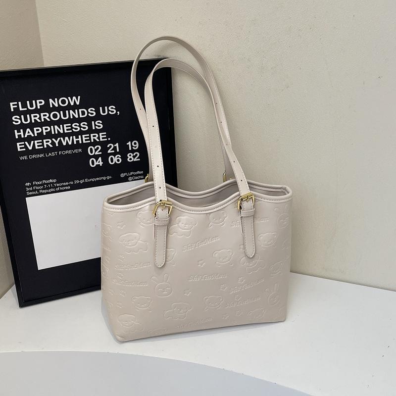 High-end contrasting color large-capacity bag women's 2025 new fashion commuter shoulder college student portable tote bag