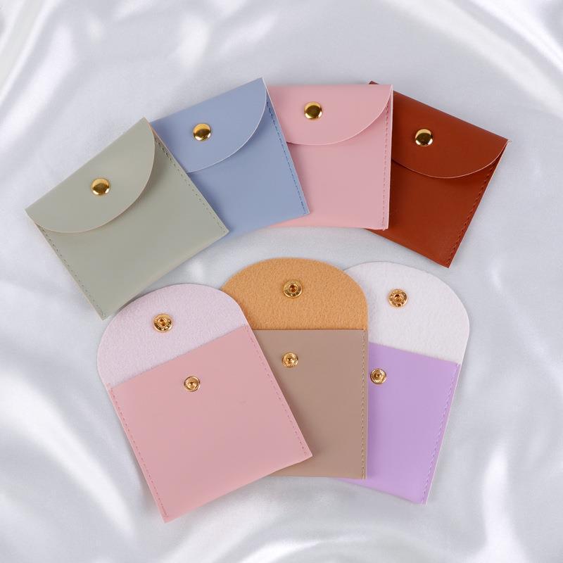 Leather Jewelry Storage Pouch: Dustproof Snap Button Bag for Necklace, Ring, Earring with Print Logo