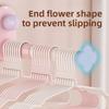 Stretchable Hanger Storage Rack - A Household Hanger Storage Solution That Uses Suction Cups and Doesn't Require Drilling Holes.