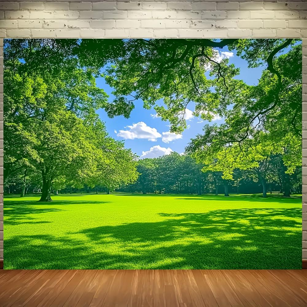 A large spring-themed banner made of polyester material features green grass and trees in its design. 100x150cm