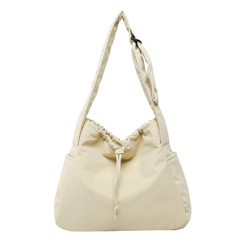 

2025 new large-capacity messenger bag women s casual versatile nylon bag commuter shoulder bag class bag бежевый