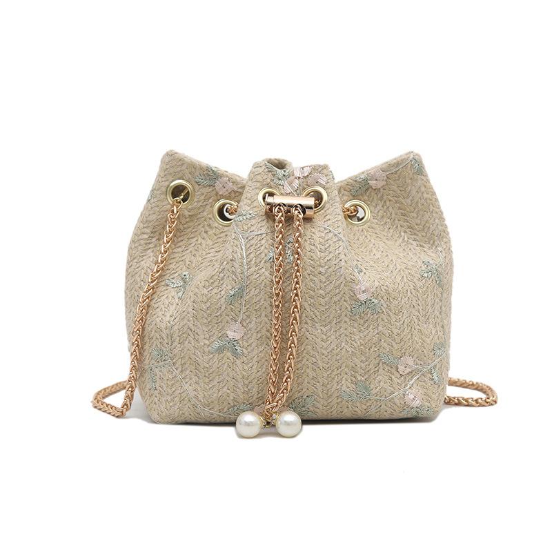 

Mori плетеная соломенная сумка-ведро женская 2025 новая летняя легкая роскошная нишевая высококлассная сумка-мессенджер на цепочке с плетением хаки