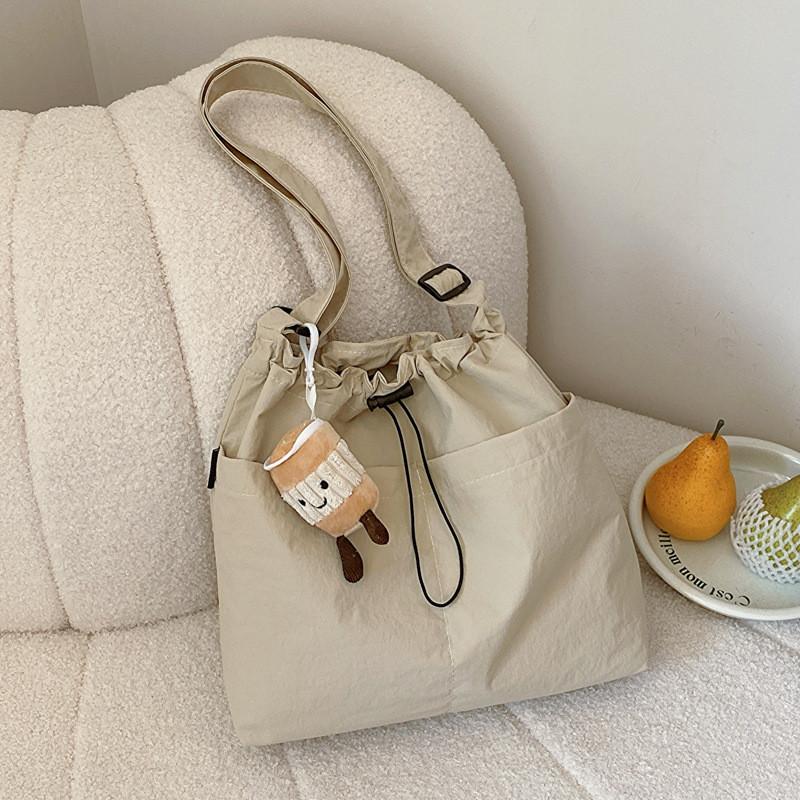 

Trendy Bucket Style Bag For Women With Unique Texture And Spacious Design For Everyday Use Cream,Without Pendant