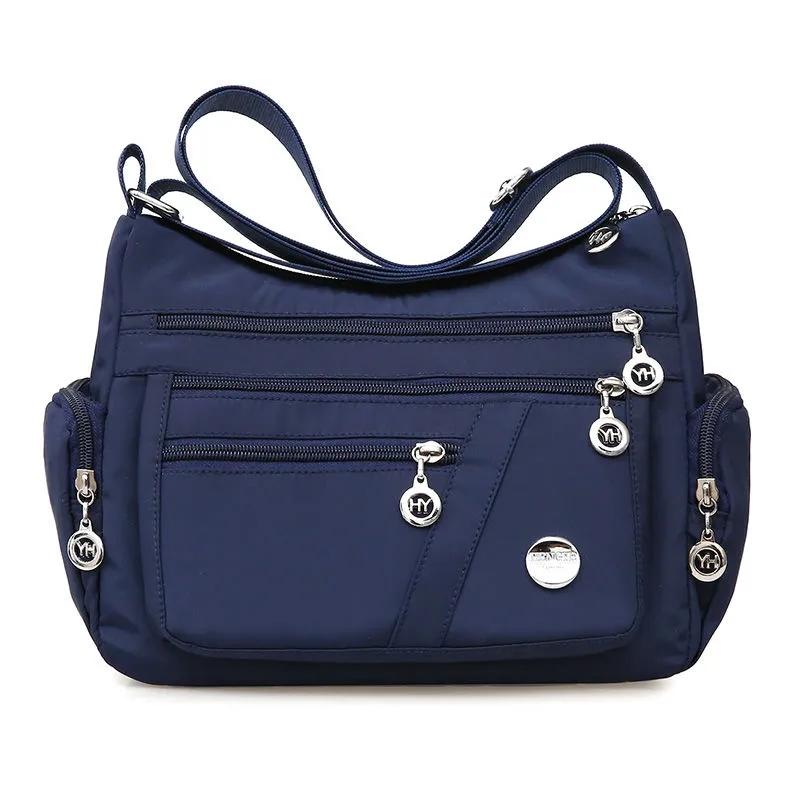 

WTEMPO женские корейские простые нейлоновые сумки однотонные сумки на одно плечо большой вместимости женские повседневные водонепроницаемые оксфордские сумки через плечо 28*11*20cm темно-синий