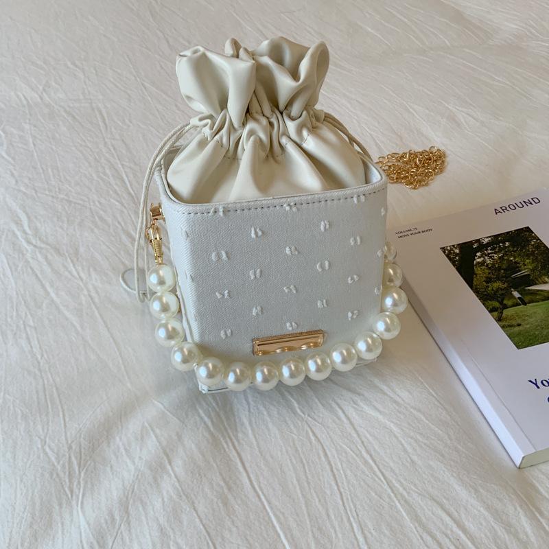 New niche bucket bag trendy personalized high-end messenger bag simple atmosphere pearl portable women's bag