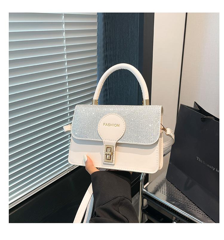 Niche lock portable small square bag women's bag 2025 summer new light luxury foreign shoulder bag commuter messenger bag