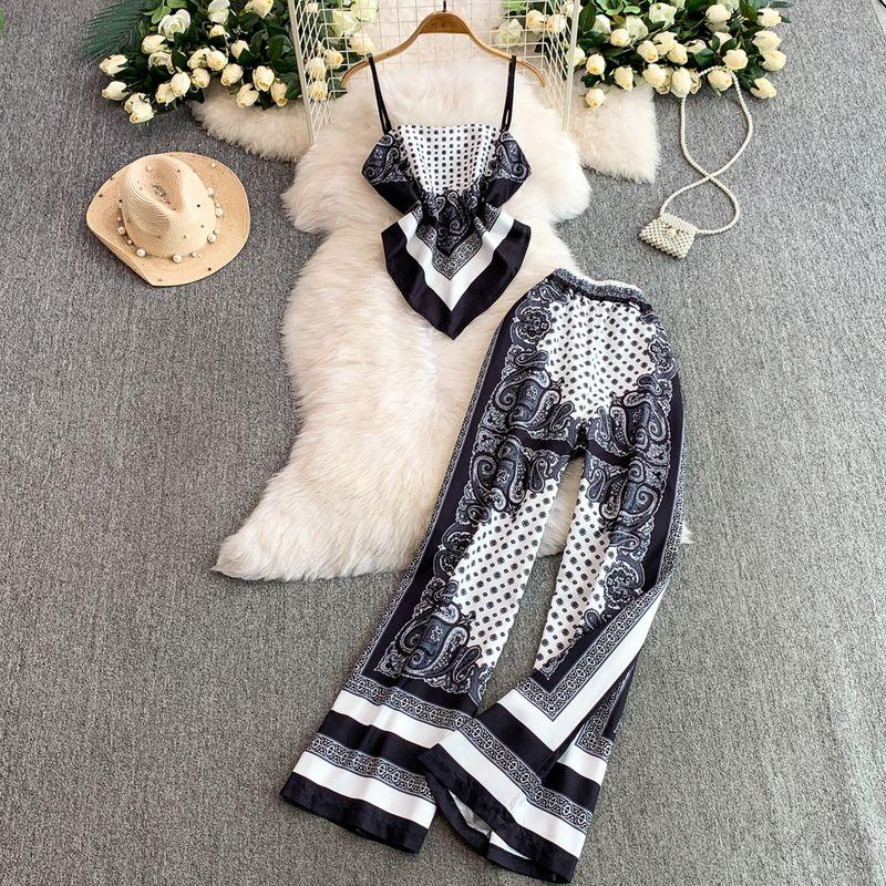 

Высококлассный сенс ретро принт нерегулярный слинг облегающий талию утягивающий жилет топ + брюки с высокой талией и широкими штанинами комплект из двух предметов Black One size