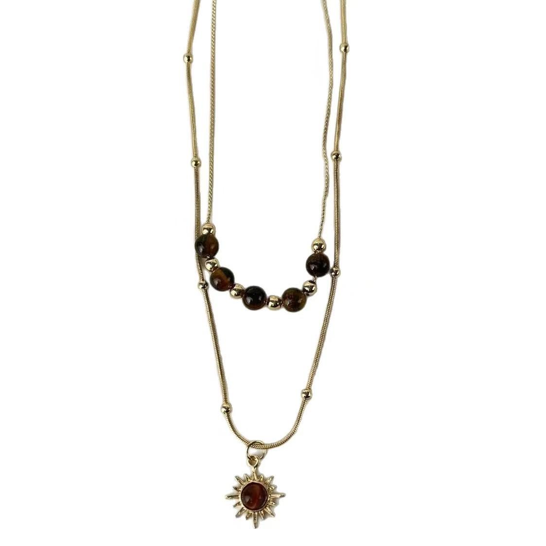 

Maillard Tiger s Eye Stone Gold Sunflower Necklace Women s Autumn and Winter Retro Stacked Sweater Chain Niche Premium Accessories
