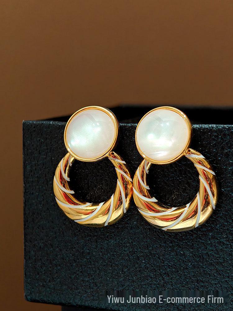 

ZLOMJS925 Silver Needle Stud Earrings - Retro Hong Kong Style, Korean Niche, Light Luxury Autumn/Winter Jewelry.