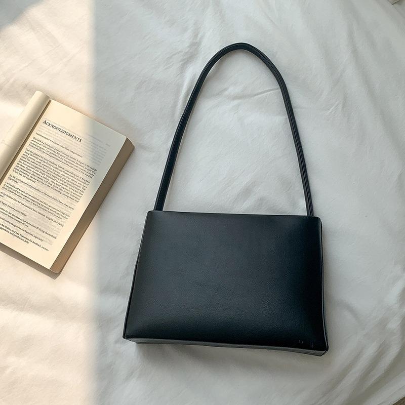 

Underarm bag female niche logo simple retro bag leather portable shoulder bag female senior sense commuting чёрный