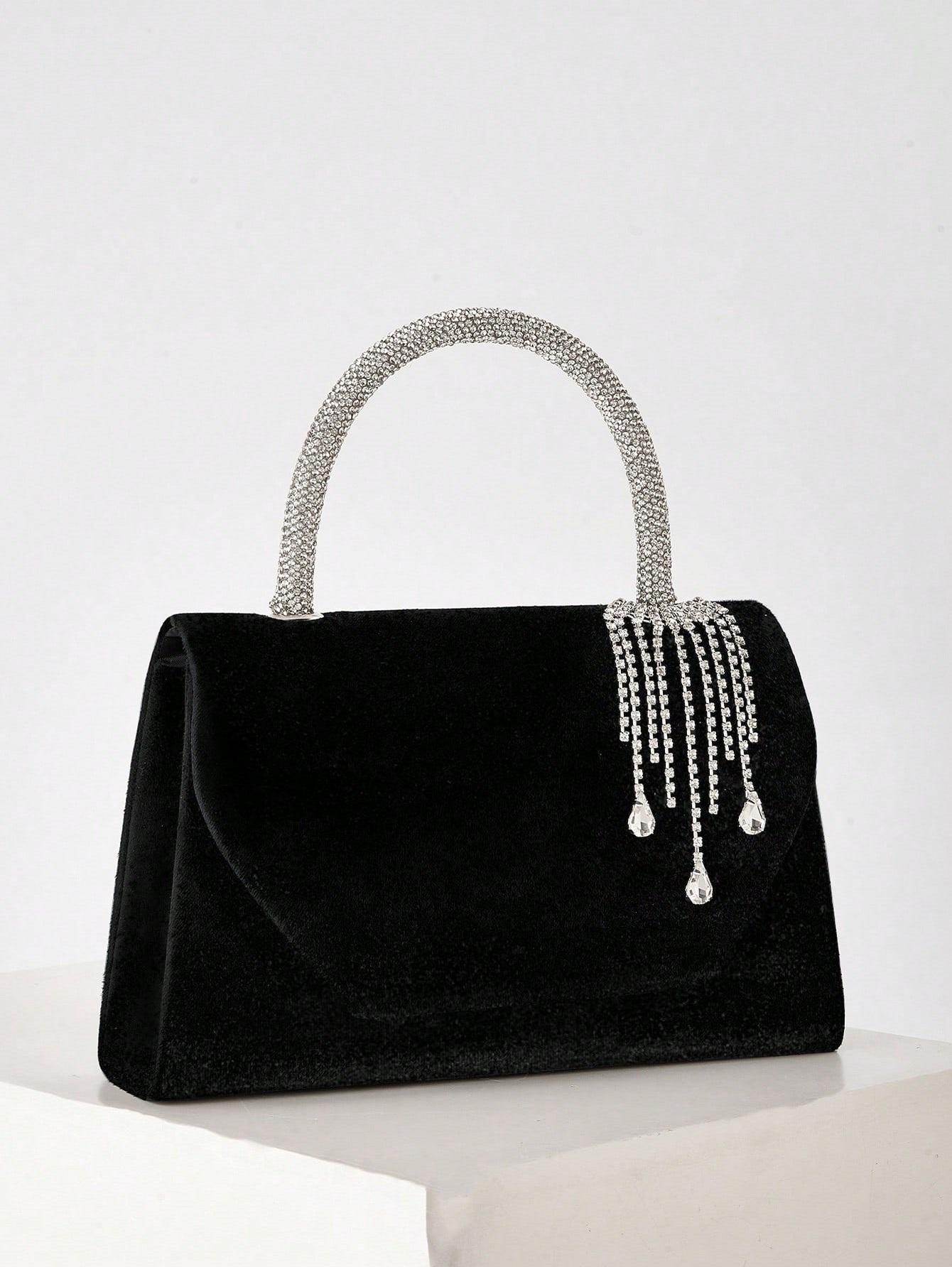 The elegant velvet rhinestone tassel tote is the perfect evening bag, pairing beautifully with skirts and cheongsams.
