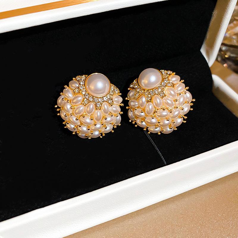 European and American pearl petal fringed earrings light luxury high-end stud earrings temperament versatile earrings design sense niche