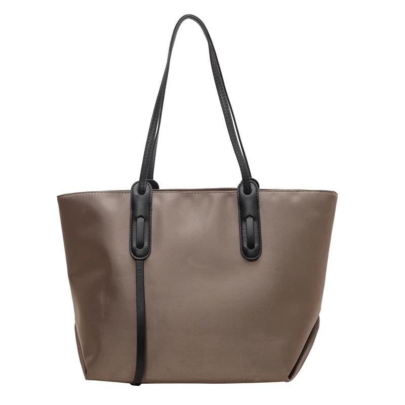 Oxford Textil Enfärgad Säljer Damers Tygväska Dragkedja Mångsidig Mode Axelväska Mjuk Enkel Populär Handväska