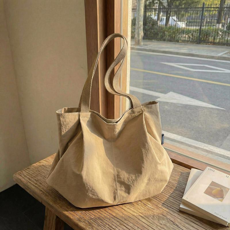 Minimalist Nylon Tote Bag with Spacious Design and Durable Handles Perfect for Everyday Use and Shopping