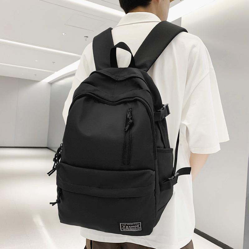 New Korean version of men's and women's large-capacity backpack, junior high school student schoolbag, casual couple college student backpack