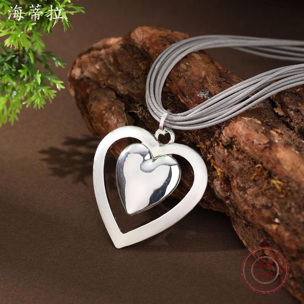 Neue Handgefertigte Gebürstete Liebesanhänger Damenmode Böhmisch Glänzendes Herz Magnetische Lederkordel Halskette