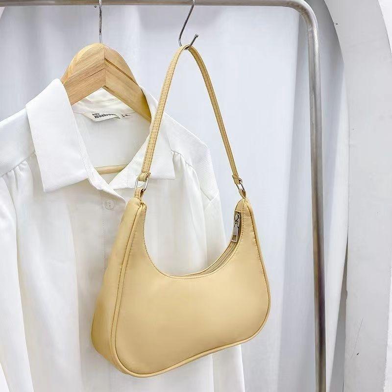 Borsa a tracolla da donna in nylon tinta unita a forma di raviolo, da portare sotto il braccio o a spalla, borsa a messaggero