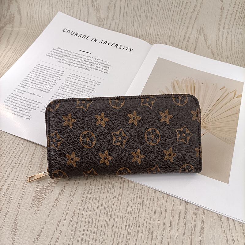 

Европейская и американская мода, большой вместимости, кошелек-клатч на молнии - много отделений для карт, простой, высококлассный дизайн 19.2 x 10 x 2.5