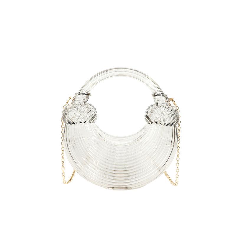 

Personalized acrylic noodle bag women s 2025 new European and American fashion diamond niche portable messenger transparent dumpling bag прозорий
