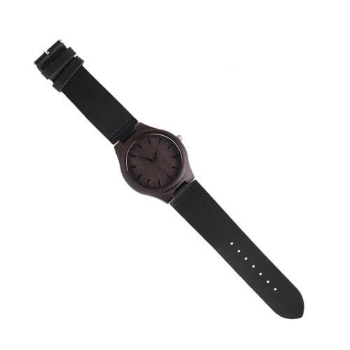 Lightweight wooden watch made of bamboo with analog hands, a Japanese-made movement, a simple dial with a mineral crystal mirror finish, and an adjust