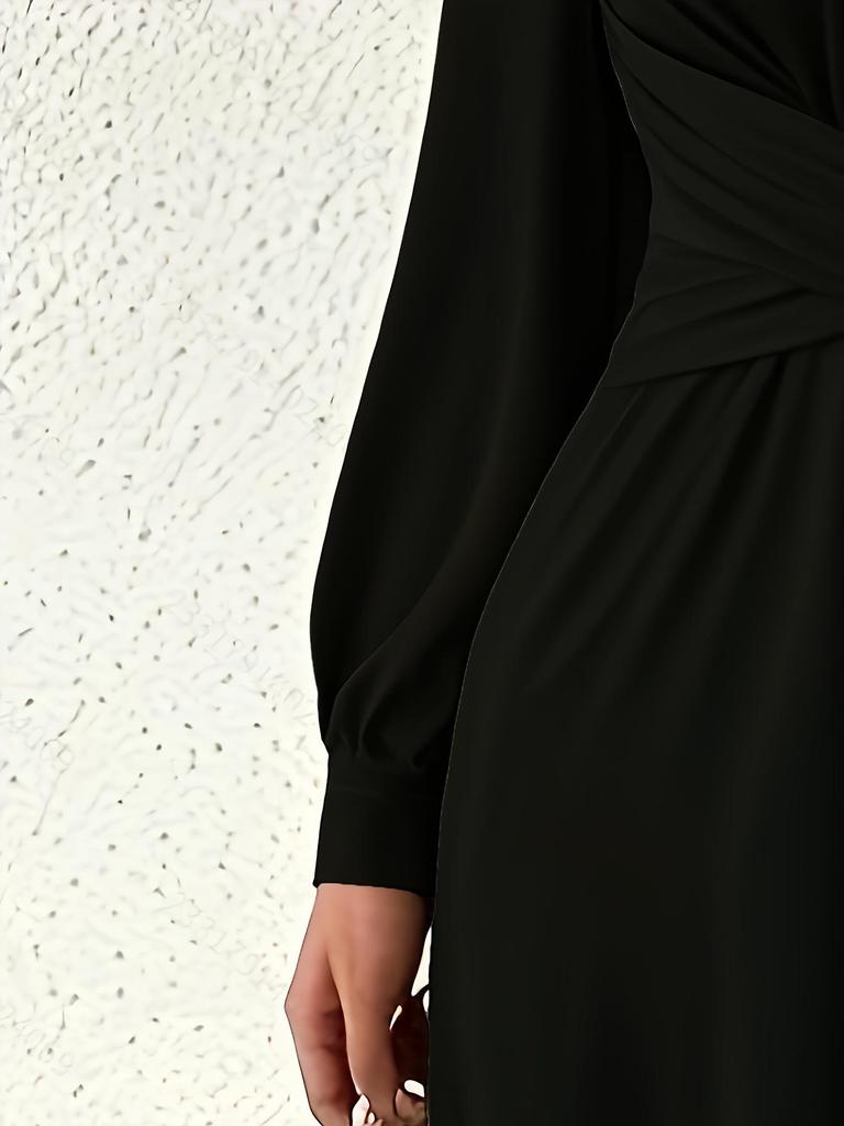 Tuta elegante da donna con scollo a V, maniche lunghe e vita incrociata