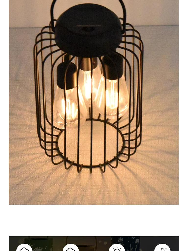 Wrought Iron Solar Garden Lantern - Decorative Outdoor Light for Courtyard and Villa.