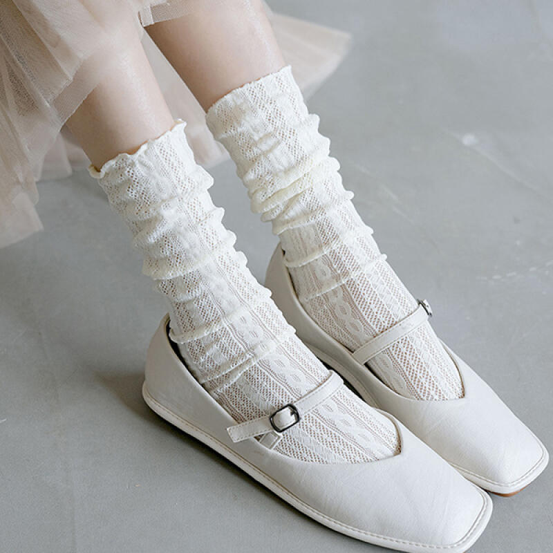 Sonobe long-sleeved see-through wave frill point socks black