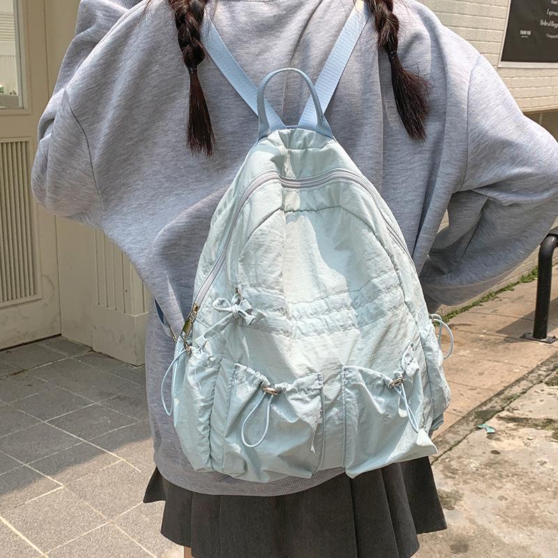 

Korean version of casual large-capacity women s bag 2025 new nylon backpack simple and versatile student bag синий