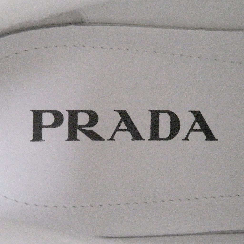Vynikající PRADA Vysoké tenisky Trojúhelníkové logo bílá kůže Pánské 6 1T638M Použité