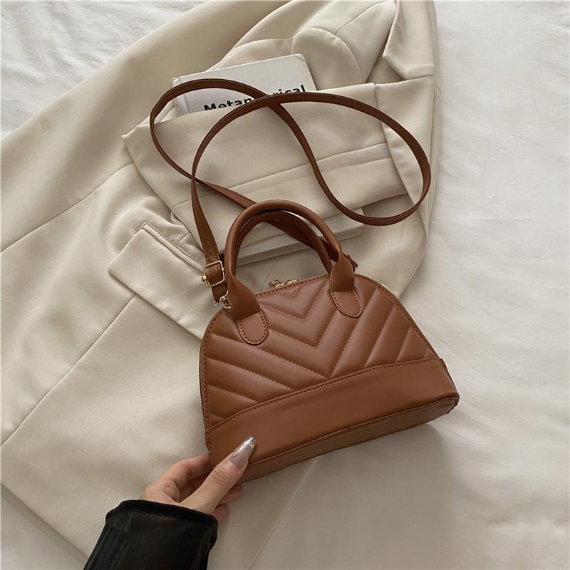 

2025 лето новая женская мода портативная сумка-ракушка простая повседневная зарубежный стиль на плечо сумка-мессенджер женская сумка коричневый