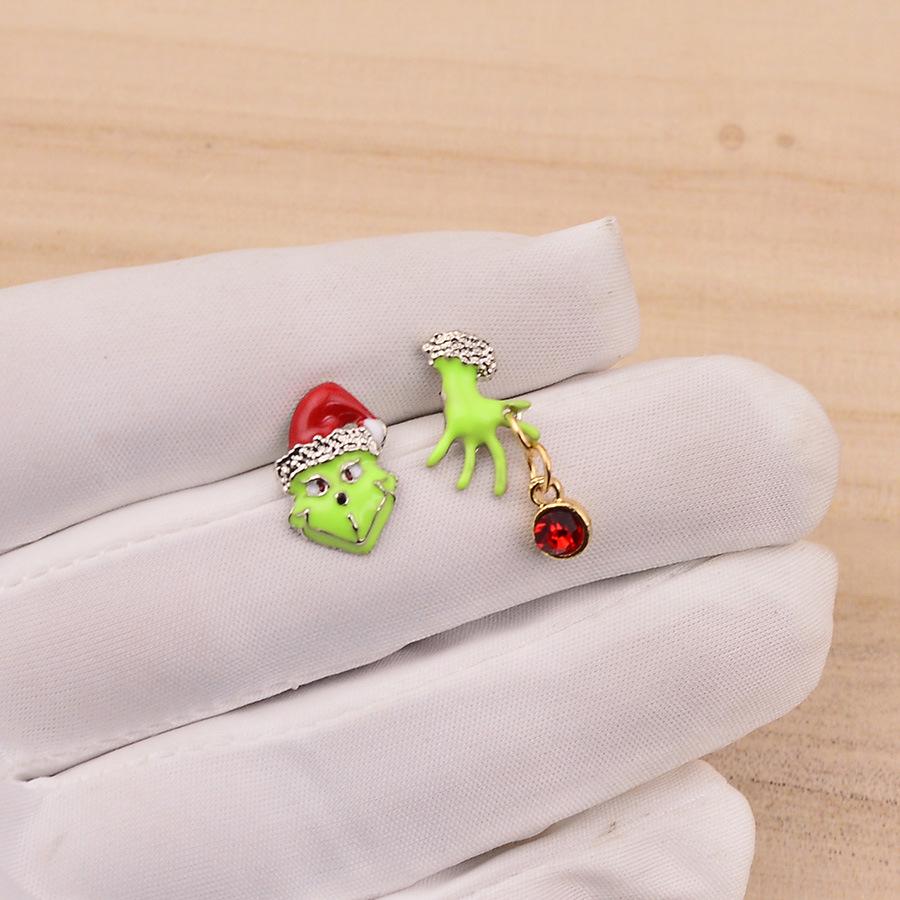 

Трансграничные рождественские серьги в виде зеленого монстра Гринча - Креативный дизайн в форме руки