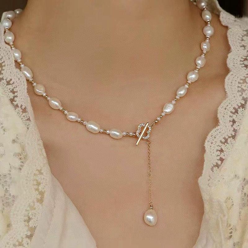 Korean natural Baroque pearl necklace INS niche light luxury design 11k gold inlaid four-leaf clover collarbone chain for women