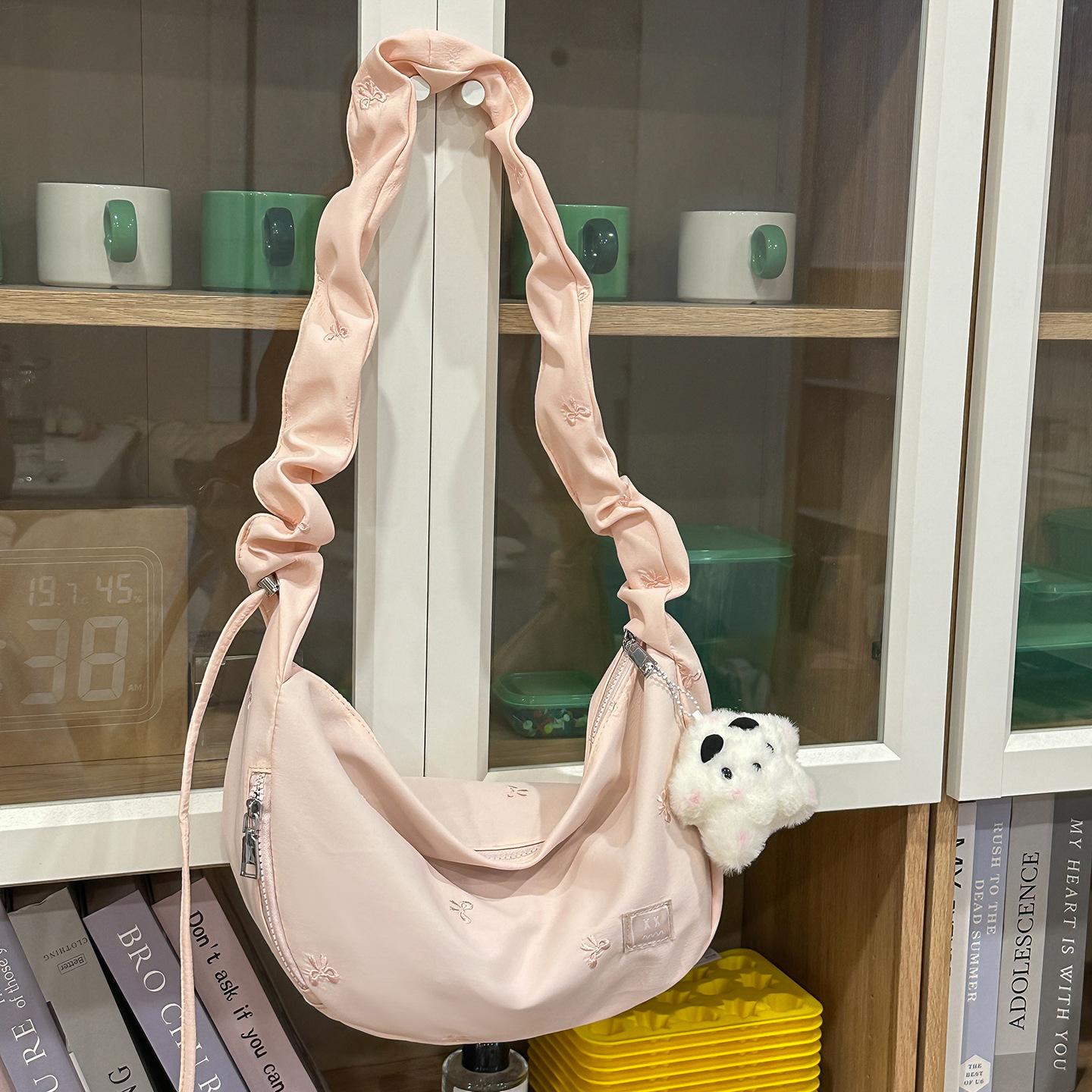 

Girls crossbody bag 2025 autumn new fashion commuter shoulder casual student canvas large capacity cloud bag no pendant розовый