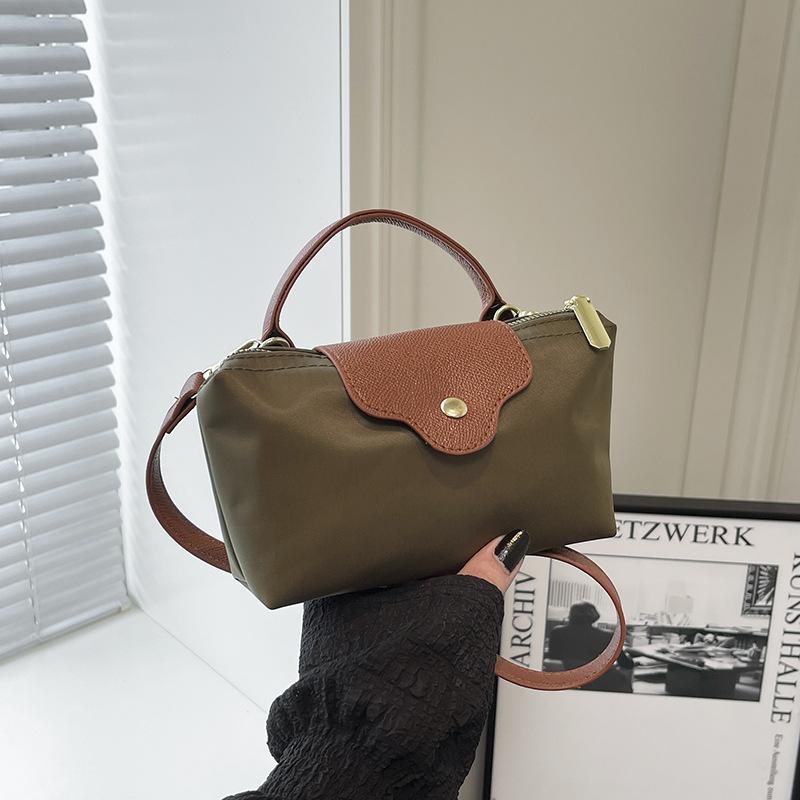 Niche machine bag nylon cloth portable dumpling bag new shoulder crossbody small bag hand change bag tide