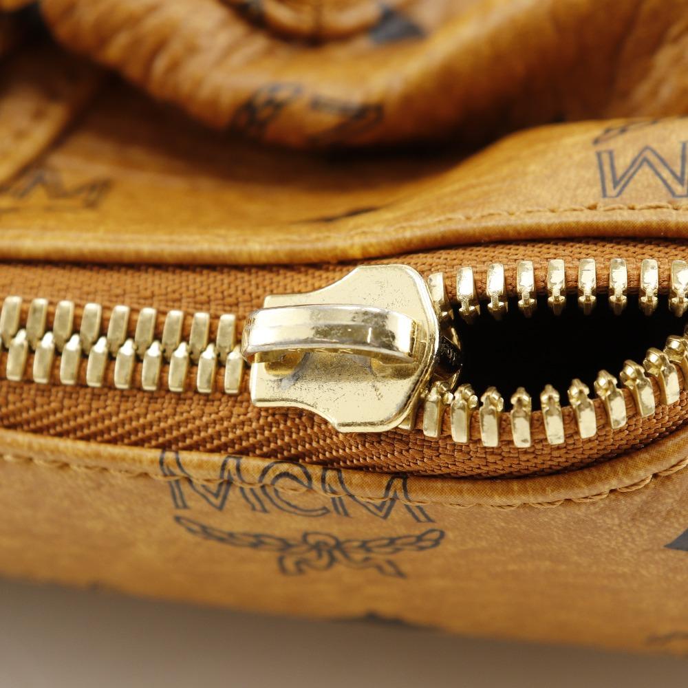 MCM Logogram Rucksack Tagesrucksack MMK2AVE20 Kleine Nieten Braun PVC Damen Gebraucht