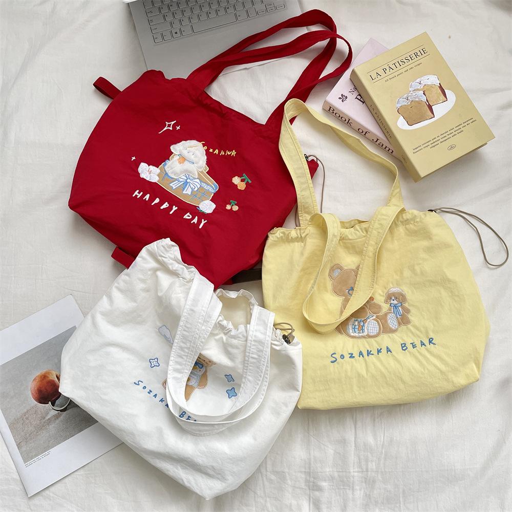 5 cute cartoon embroidered canvas bag large capacity women's simple versatile drawstring bundle single shoulder handbag