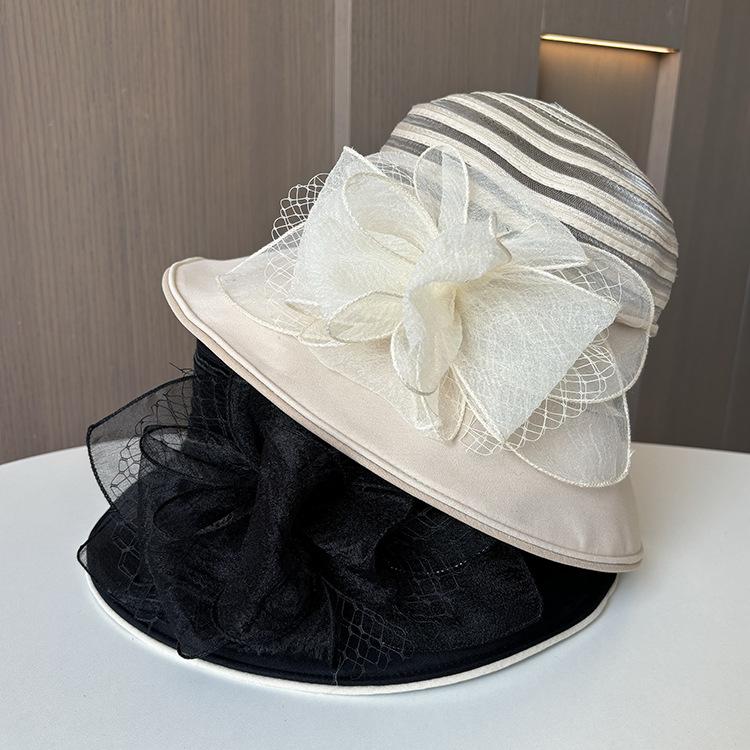 Eugen yarn flower pot hat outdoor casual fashion sunshade sunscreen hat summer new women's big edge breathable cool hat