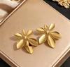 Stainless steel high-end gold earrings, niche design light luxury metal studs, temperament earrings