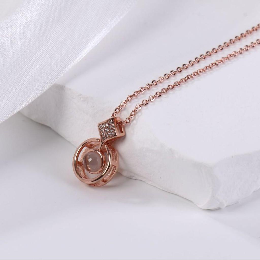 Trendy Women's Necklace: Rose Gold Elf's Tears Pendant Projection