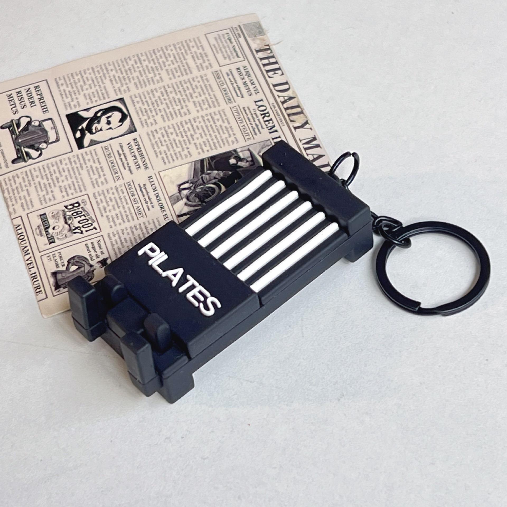 

Eco-Friendly Soft Rubber Core Pilates Studio Keychain & Fitness Bag Pendant