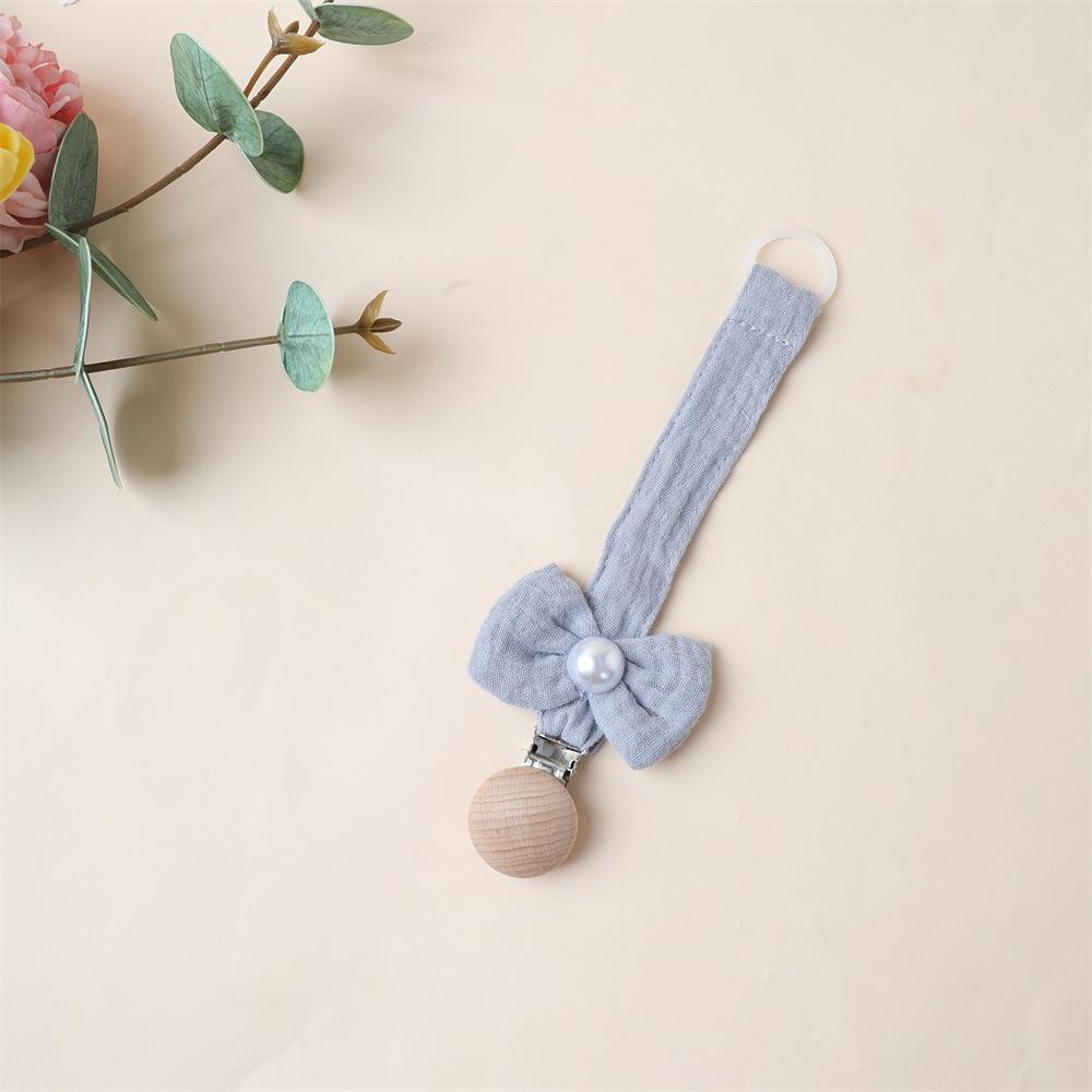 1 Stück Niedlicher Neugeborener Mädchen Schnuller Clip Kette Süße Prinzessin Schleife Schnullerclip Kette Stoff Holz Anti-Verloren Spielzeug Schnullerkette
