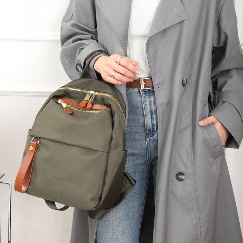 

Водонепроницаемый легкий рюкзак из ткани Оксфорд, женский нишевый дизайн, повседневный рюкзак, мода 31 * 26 * 15CM