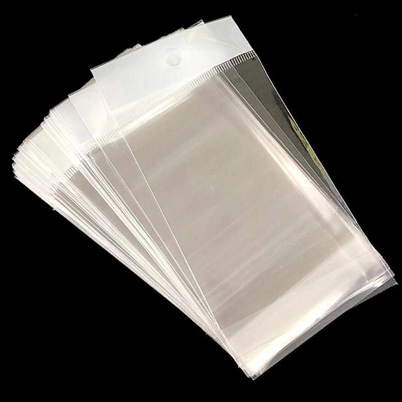 100 pièces Sac d'emballage transparent auto-adhésif Poches Opp en plastique à suspendre Sacs d'étanchéité Cadeaux pour présentation de bijoux Emballage de vente au détail